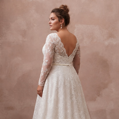 Ivory lace A-line wedding dress with sheer long sleeves and low open back