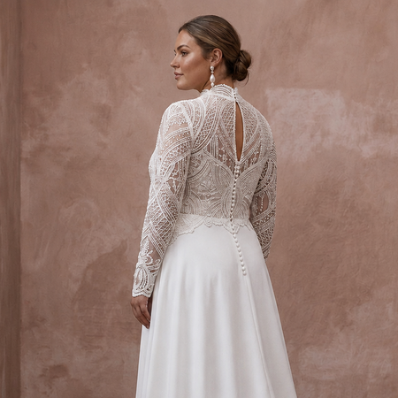 White lace wedding dress with high neck and intricate open-back embroidery