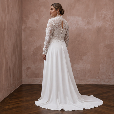 White A-line wedding dress with lace long sleeves, high neckline, and open back