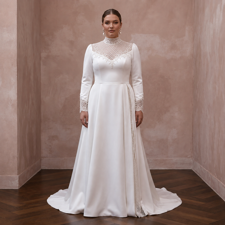 White satin wedding dress with lace high neckline, long sleeves, and back drape train