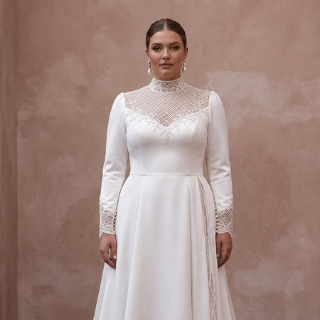 White satin wedding dress with lace illusion high neck and long fitted sleeves