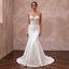 Elegant pure white matte satin wedding dress with a dropped waist and intricate beaded embroidery.