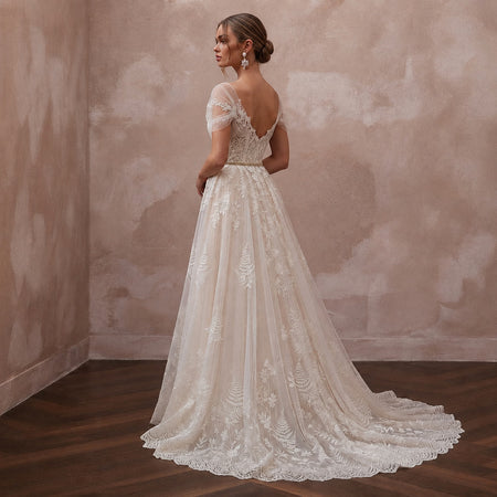 Romantic Lace Bridal Dress with Chapel Train for a Forest Wedding