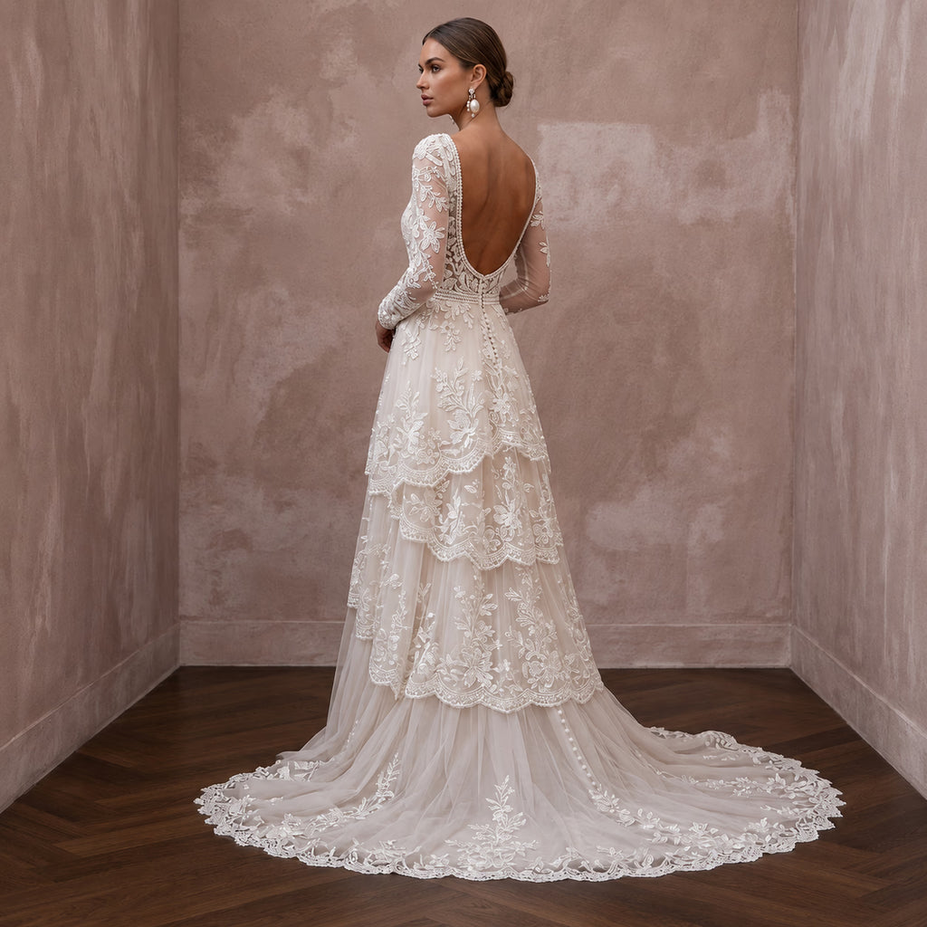 Romantic Lace Bridal Dress with Floral Motifs for an Outdoor Ceremony