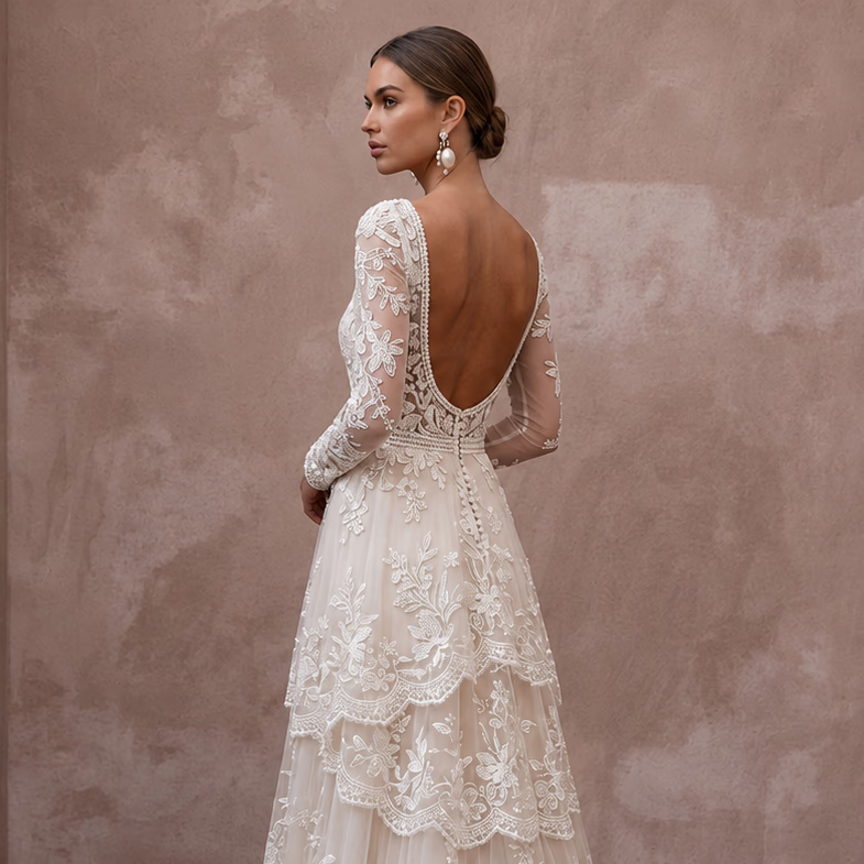 Romantic Lace Bridal Dress with Floral Motifs for an Outdoor Ceremony