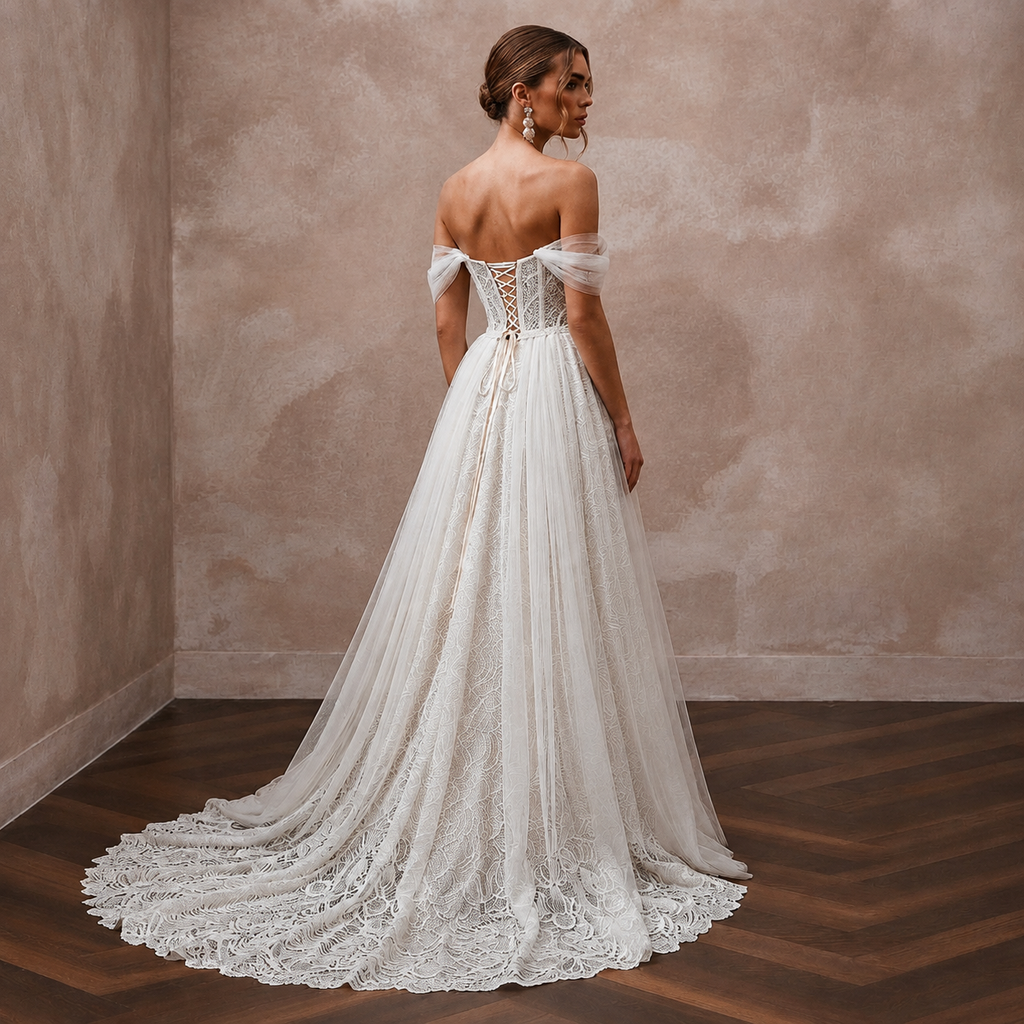 Ivory off-the-shoulder lace bridal gown, draped back and flowing tulle skirt