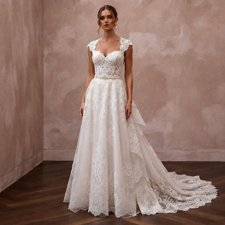 Romantic Lace Wedding Dress with Detachable Train and A-Line Silhouette