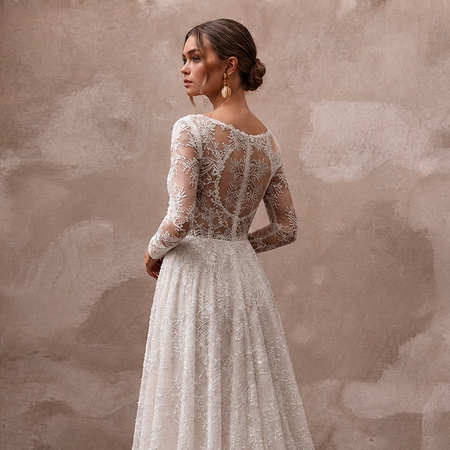 Romantic Lace Wedding Dress with Long Sleeves and A-Line Silhouette