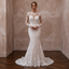 Lace wedding dress with long sleeves and trumpet silhouette