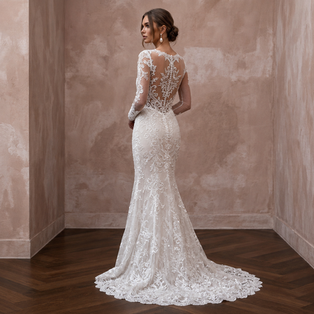 White lace wedding dress back view with long sleeves, sheer lace and trumpet skirt