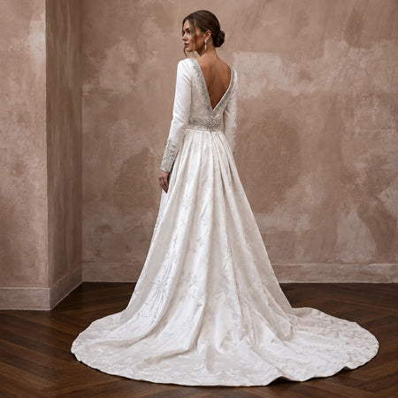 Romantic Satin Wedding Gown for a Winter Ballroom Ceremony