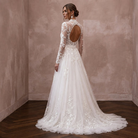 Romantic Tulle Wedding Dress with Long Sleeves and A-Line Silhouette