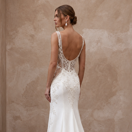 Elegant scoop neck lace wedding dress with intricate detailing, perfect for a vintage-inspired ceremony.