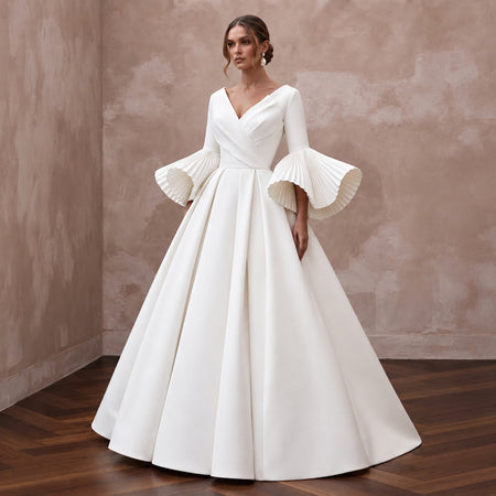 Sculptural White Faille Bell Sleeve Bridal Gown for Museum Reception