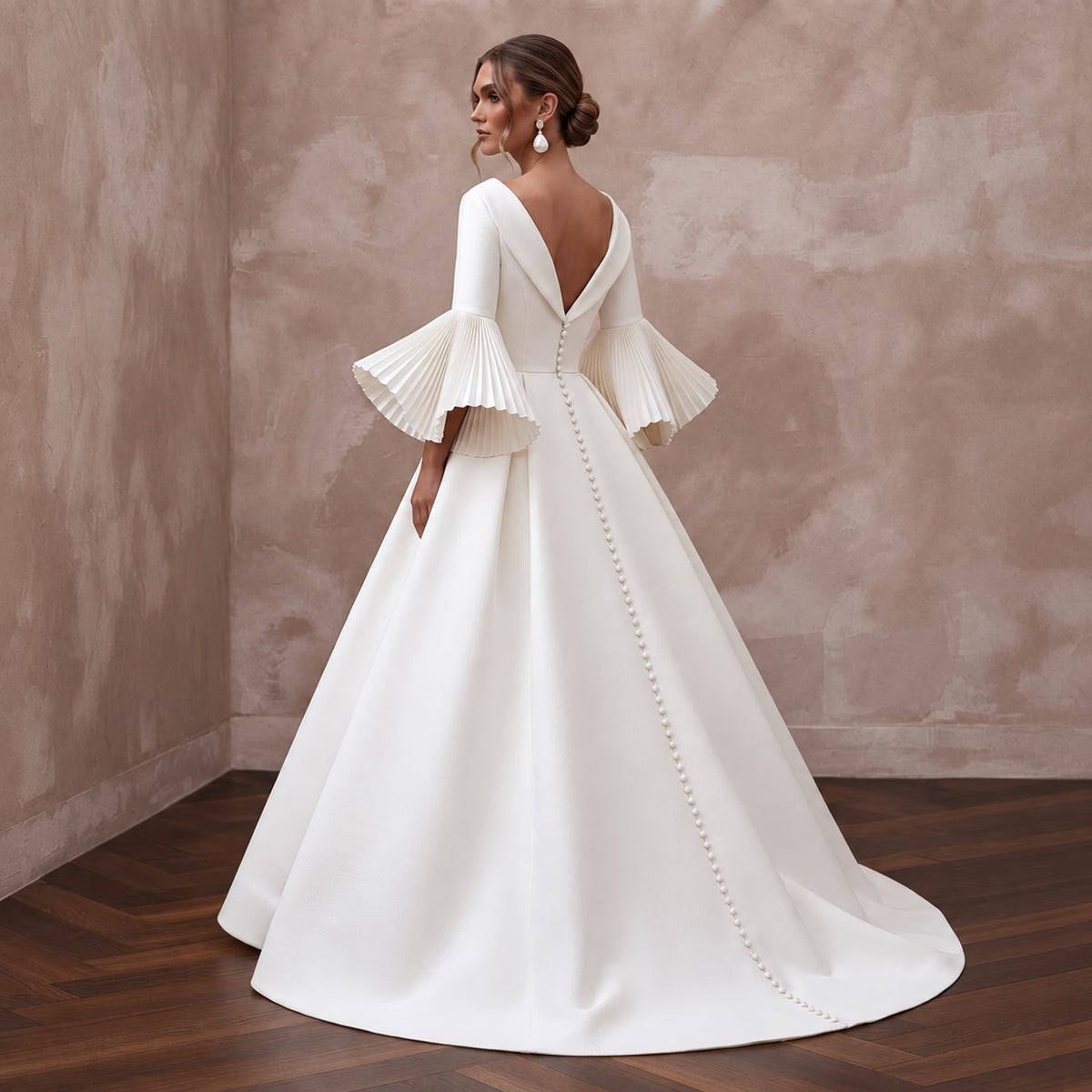 Sculptural White Faille Bell Sleeve Bridal Gown for Museum Reception