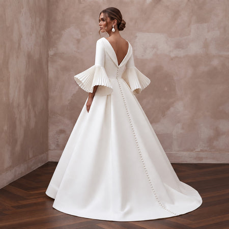Sculptural White Faille Bell Sleeve Bridal Gown for Museum Reception