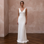 White V-neck crepe sheath wedding dress with sleeveless bodice and floor-length skirt