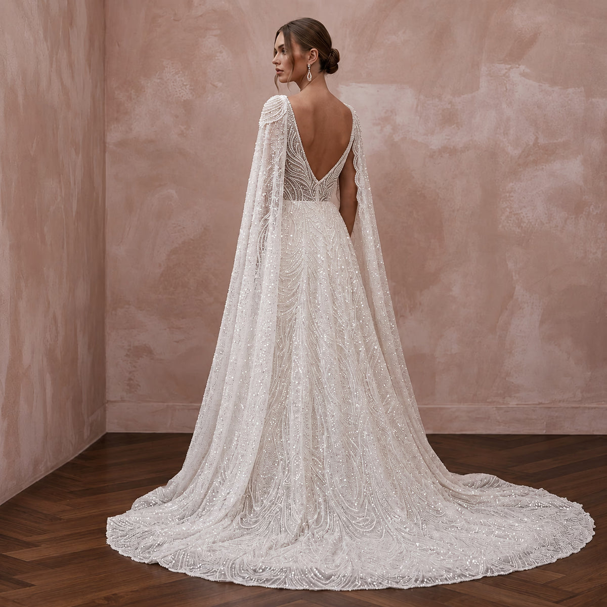 Seraphic Ivory Sequin Tulle Caped Bridal Gown for Engagement Gala