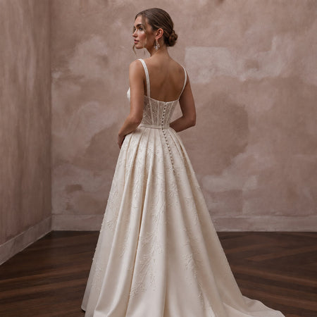 Sophisticated Wedding Dresses with Sculpted Corset Waists - Apparel & Accessories > Clothing > Wedding & Bridal Party Dresses > Wedding Dresses - Mignonette