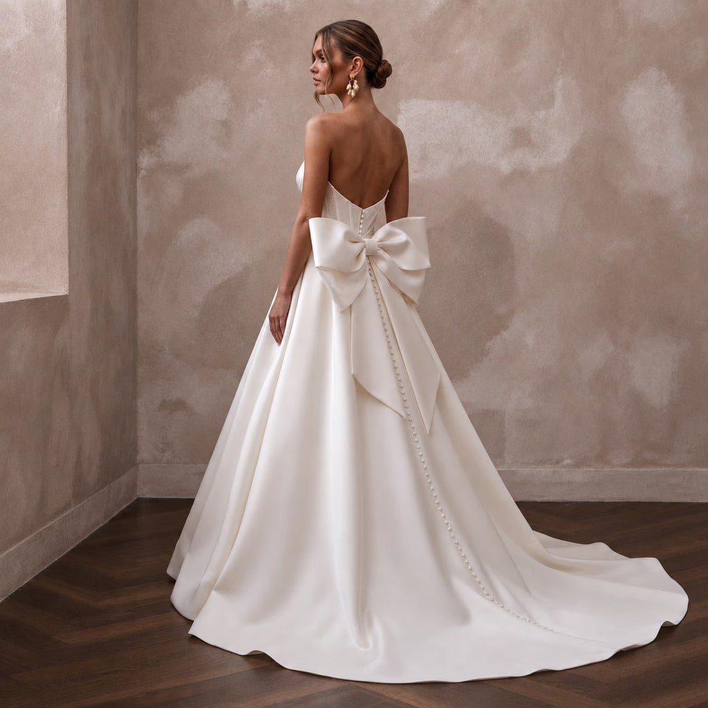 Strapless Wedding Dresses with Draped Satin Bodices - Apparel & Accessories > Clothing > Wedding & Bridal Party Dresses > Wedding Dresses - Mignonette