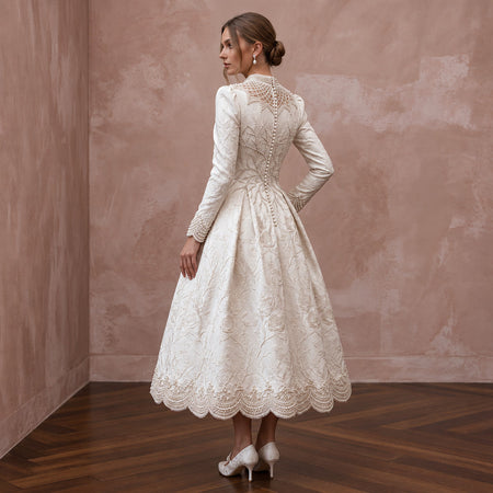 Textured Off-White Brocade Tea-Length Bridal Gown for Winter Rehearsal