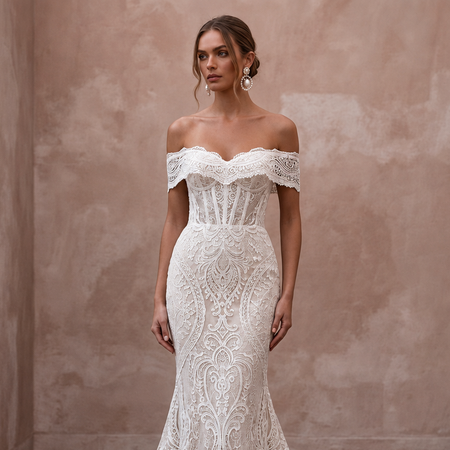 White lace off-shoulder mermaid wedding dress with sweetheart neckline and corset details