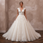 White lace V-neck ball gown wedding dress, fitted bodice, full skirt