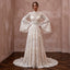 Vintage Lace Wedding Gown with Bell Sleeves for a Country Ceremony