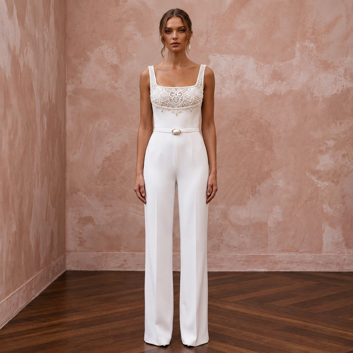 White stretch crepe jumpsuit with square neck and embellished bodice, perfect for a courthouse wedding.