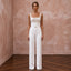 White stretch crepe jumpsuit with square neck and embellished bodice, perfect for a courthouse wedding.